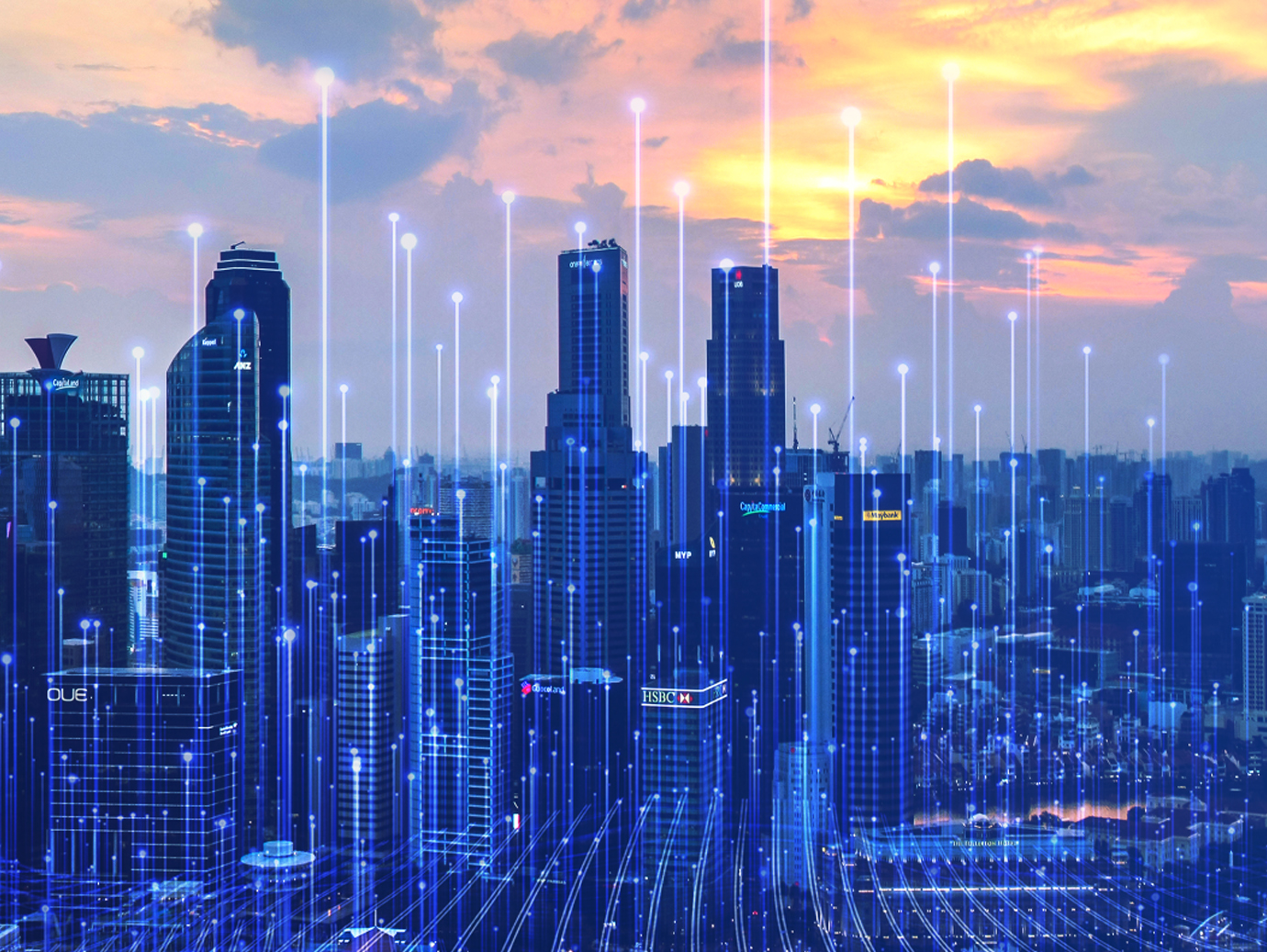 A cityscape at dusk with graphics