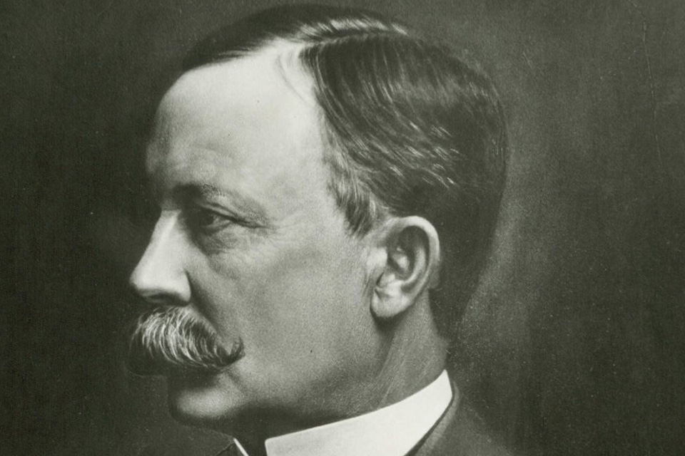 Greyscale portrait of Warren Johnson